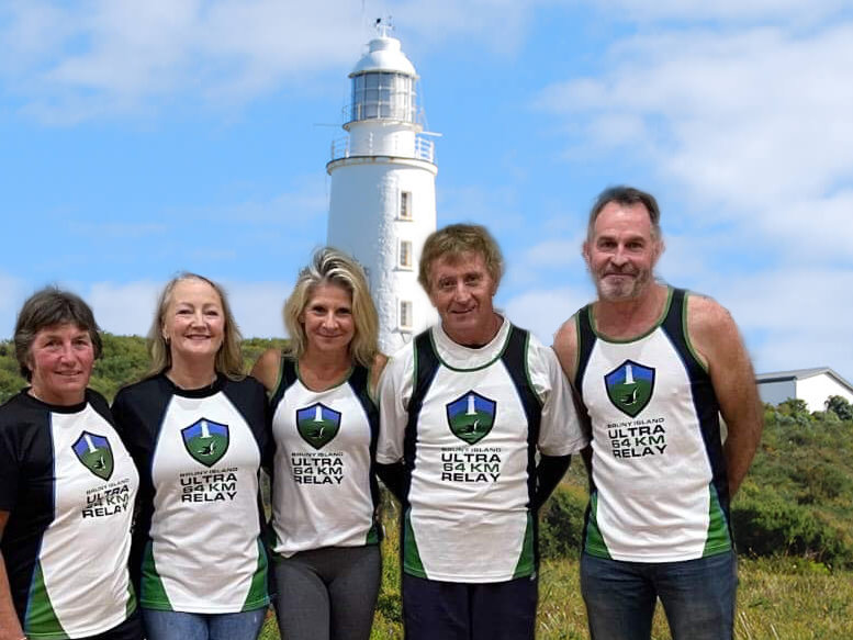 Committee in front of light house